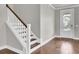 Entryway with staircase featuring wood steps and white railing at 528 Fern Tree Dr, Summerville, SC 29486