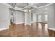 Bright, open-concept living room with hardwood floors and coffered ceilings at 528 Fern Tree Dr, Summerville, SC 29486
