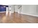 Bright living room features hardwood floors, a staircase, and an open floor plan at 528 Fern Tree Dr, Summerville, SC 29486