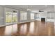 Living room features a fireplace, wood floors, built-in shelving, and sliding glass doors leading to the patio at 528 Fern Tree Dr, Summerville, SC 29486