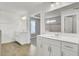 Elegant main bathroom with double vanity, white cabinetry, and tiled floors provides a spa-like retreat at 528 Fern Tree Dr, Summerville, SC 29486
