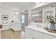 Bright and modern main bathroom with double vanity, and a view of the large shower at 528 Fern Tree Dr, Summerville, SC 29486