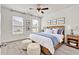Sun-filled main bedroom featuring stylish decor, a ceiling fan, and bright windows at 528 Fern Tree Dr, Summerville, SC 29486