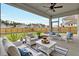 Cozy screened-in porch with comfortable seating, perfect for outdoor relaxation and enjoying the backyard view at 528 Fern Tree Dr, Summerville, SC 29486