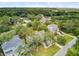 Aerial view of a home with lush greenery and a serene waterfront setting in a vibrant community at 634 Lynne Ave, Charleston, SC 29412