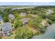Beautiful waterfront property with a large yard, a deck, and lots of trees at 634 Lynne Ave, Charleston, SC 29412