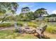 Inviting backyard firepit surrounded by seating, creating a cozy outdoor gathering space at 634 Lynne Ave, Charleston, SC 29412