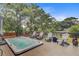 Backyard deck featuring a hot tub, chairs and outdoor seating at 634 Lynne Ave, Charleston, SC 29412