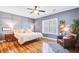 Bright main bedroom offering plantation shutters, ceiling fan, and neutral decor, creating a peaceful and inviting space at 634 Lynne Ave, Charleston, SC 29412