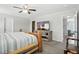 Bedroom featuring a rustic wooden bed frame, ceiling fan, and gray colored walls at 7164 Sweetgrass Blvd, Hanahan, SC 29410