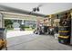 Spacious garage with high ceilings, organized shelving, and plenty of storage space at 7164 Sweetgrass Blvd, Hanahan, SC 29410