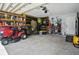Spacious garage with high ceilings, organized shelving, and plenty of storage space at 7164 Sweetgrass Blvd, Hanahan, SC 29410