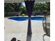 Inviting in-ground pool surrounded by concrete, creating a serene outdoor space for relaxation and recreation at 7164 Sweetgrass Blvd, Hanahan, SC 29410