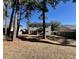 Spacious backyard with a screened-in porch and solar panels on the roof at 7277 Sweetgrass Blvd, Hanahan, SC 29410