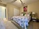 Cozy bedroom featuring plush bedding, carpet floors, and soft, natural lighting at 7277 Sweetgrass Blvd, Hanahan, SC 29410