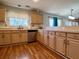 Spacious kitchen with light wood cabinets and stainless-steel appliances at 7277 Sweetgrass Blvd, Hanahan, SC 29410