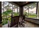 Relaxing balcony featuring comfortable seating and stunning views of the natural scenery and serene marshland at 79 Trailing Vine Way, Kiawah Island, SC 29455