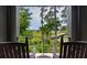 Relaxing balcony with picturesque views of lush greenery and a marsh waterway at 79 Trailing Vine Way, Kiawah Island, SC 29455