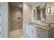 A modern bathroom featuring a glass shower and granite countertops at 79 Trailing Vine Way, Kiawah Island, SC 29455
