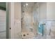Modern bathroom features a glass-enclosed shower with marble tiling and a built-in seat at 79 Trailing Vine Way, Kiawah Island, SC 29455