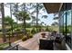 Scenic deck with comfortable seating and serene views of the surrounding landscape and marshland at 79 Trailing Vine Way, Kiawah Island, SC 29455