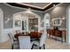 Elegant dining room with hardwood floors, and stylish furnishings with a beautiful arched doorway at 79 Trailing Vine Way, Kiawah Island, SC 29455