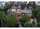 Beautiful exterior of the home surrounded by lush landscaping, a unique entryway, and architectural details at 79 Trailing Vine Way, Kiawah Island, SC 29455