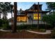 Beautiful home exterior with lush landscaping and a winding walkway at 79 Trailing Vine Way, Kiawah Island, SC 29455