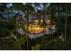 Picturesque home exterior nestled among trees, featuring an inviting outdoor space at 79 Trailing Vine Way, Kiawah Island, SC 29455