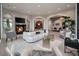 Spacious living room with fireplace and view to entryway, dining area, and connected room at 79 Trailing Vine Way, Kiawah Island, SC 29455