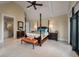 Spacious main bedroom boasts a vaulted ceiling, ensuite bathroom, and refined furnishings at 79 Trailing Vine Way, Kiawah Island, SC 29455