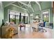 Home office with vaulted ceilings, recessed lighting, large windows, and a balcony view at 79 Trailing Vine Way, Kiawah Island, SC 29455