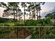 Expansive views from balcony overlooking the marsh and a private winding walking path at 79 Trailing Vine Way, Kiawah Island, SC 29455