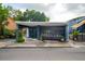 Charming tavern with modern design, open patio seating, inviting storefront, and attractive curb appeal at 9 F St, Charleston, SC 29403