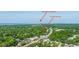 Beautiful aerial view of 977 Warrick Lane, nestled in a lush, tree-filled area near downtown Charleston at 977 Warrick Oaks Ln, Mount Pleasant, SC 29464