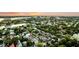 Expansive aerial view of the city, highlighting the buildings, water, and green landscape at 10 Trapman St, Charleston, SC 29401