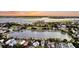 Stunning aerial view overlooking a park, lake, and surrounding cityscape at sunset at 10 Trapman St, Charleston, SC 29401