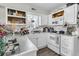Functional kitchen with white cabinets, oven, and sink at 10 Trapman St, Charleston, SC 29401