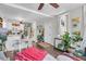 Bright living area with eat-in kitchen, round dining table, and comfortable beanbag chair at 10 Trapman St, Charleston, SC 29401