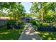 Charming backyard featuring stone pathway and garden beds perfect for outdoor enjoyment at 102 Cottonwood Dr, Summerville, SC 29483