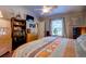 Comfortable bedroom with a view of the window, a ceiling fan and hardwood floors at 102 Cottonwood Dr, Summerville, SC 29483