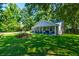 Charming front yard with a covered porch swing provides a relaxing outdoor living space at 102 Cottonwood Dr, Summerville, SC 29483