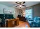 Comfortable office featuring natural light and hardwood flooring at 102 Cottonwood Dr, Summerville, SC 29483
