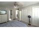 Bedroom featuring ensuite bathroom access and multiple closets, bathed in natural light at 104 Queens Ct, Summerville, SC 29485