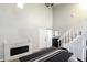 Bright living area with fireplace and large staircase at 104 Queens Ct, Summerville, SC 29485