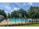 Community pool featuring lounge chairs, umbrellas, and a refreshing place to relax and enjoy sunny days at 104 Queens Ct, Summerville, SC 29485
