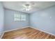 Sun-filled bedroom featuring a ceiling fan, hardwood floors and ample natural light at 108 Reardon St, Moncks Corner, SC 29461
