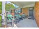 Charming front porch with seating, providing a welcoming entrance to the home at 108 Reardon St, Moncks Corner, SC 29461