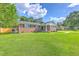 Beautifully maintained brick house with lush green lawn at 108 Reardon St, Moncks Corner, SC 29461