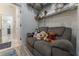 Bonus room with stuffed animals, love seat, and storage shelves at 109 Carolina Blvd, Isle of Palms, SC 29451